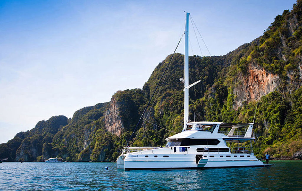 Explore Phuket’s pristine coastline from a private yacht. Image copyright:...