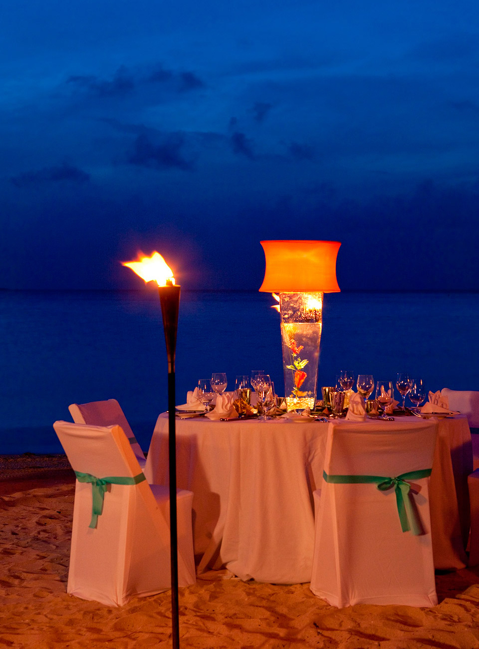 Enjoy beautiful sunset dining on the beach.